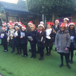 School groups singing for Cherry Lodge
